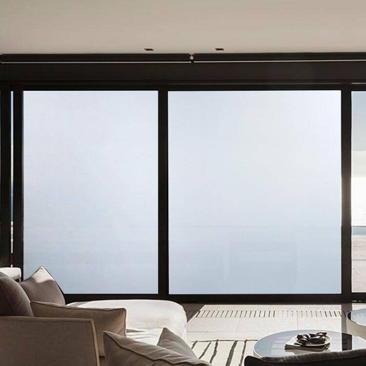 Frosted window film applied to a bathroom window for privacy